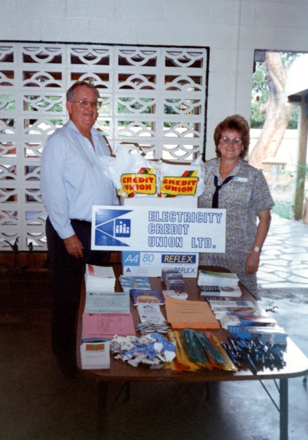 Clive Skarrott (left) opens a makeshift agency for Electricity Credit Union in Forsyth, Far North Queensland in 1996.
