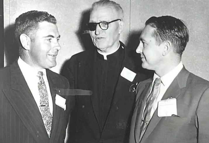 From left, Clarrie Murphy, Father Moses Coady (Antigonish pioneer) and Kevin Young at the CUNA Convention, Maddison USA, 1958